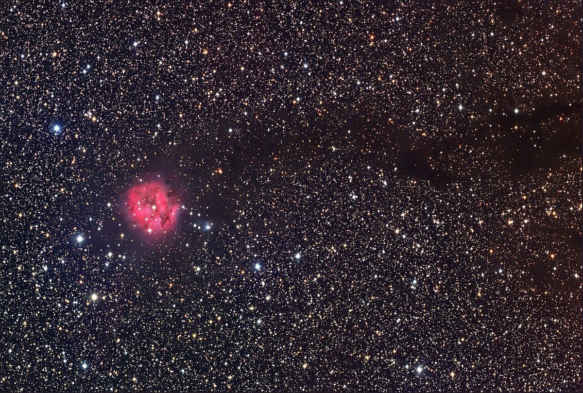 Photograph of Cocoon Nebula (IC 5146), an emission nebula in Cygnus