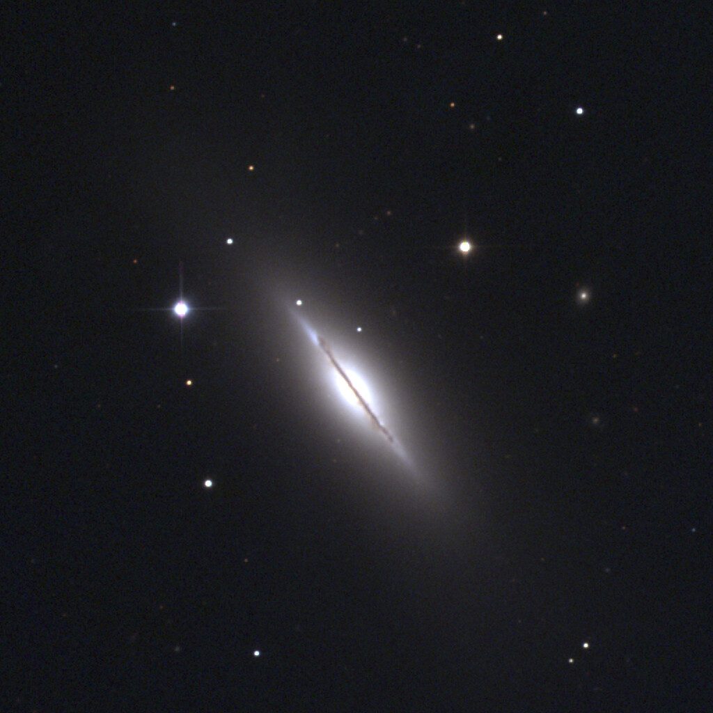 Photograph of Spindle Galaxy (M102), a lenticular galaxy in Draco