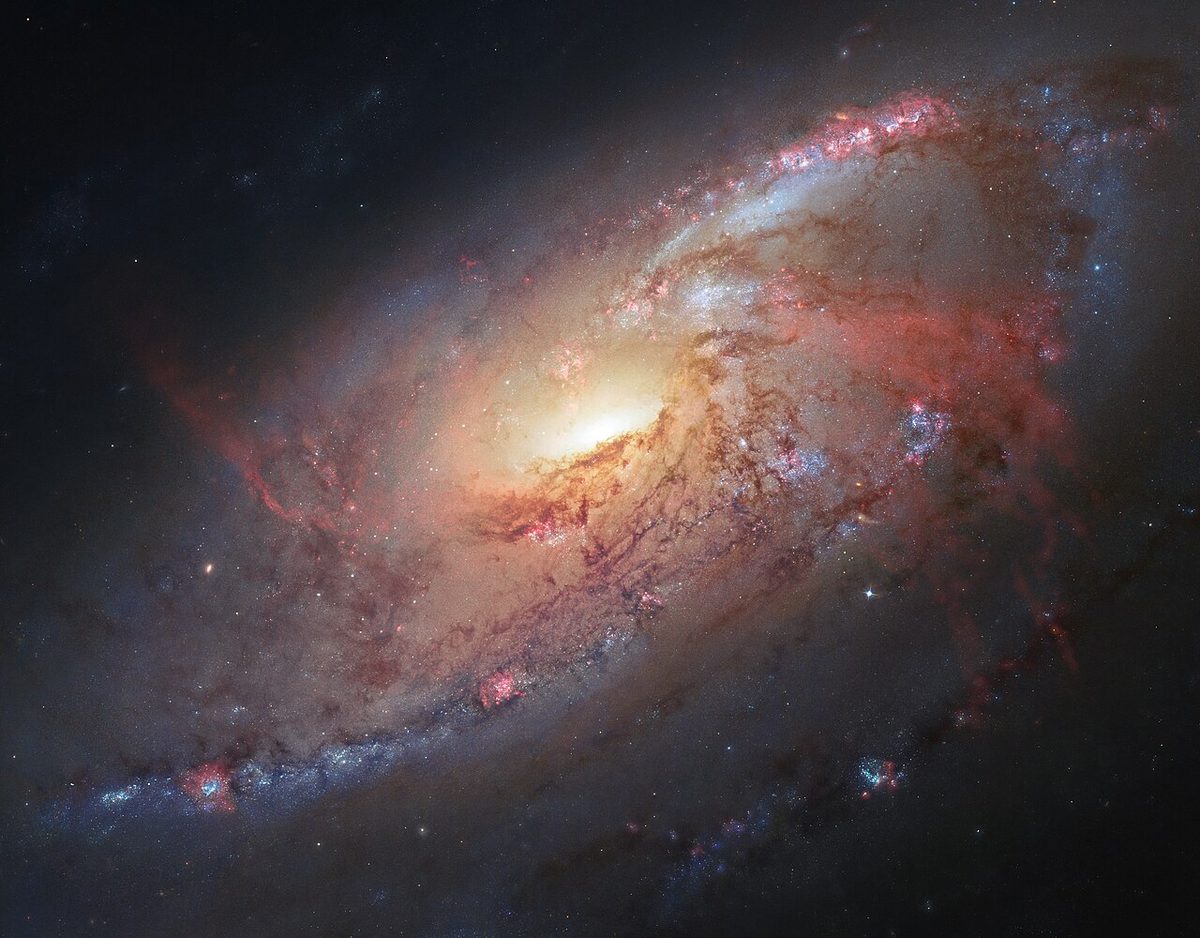 Photograph of M106, a spiral galaxy in Canes Venatici