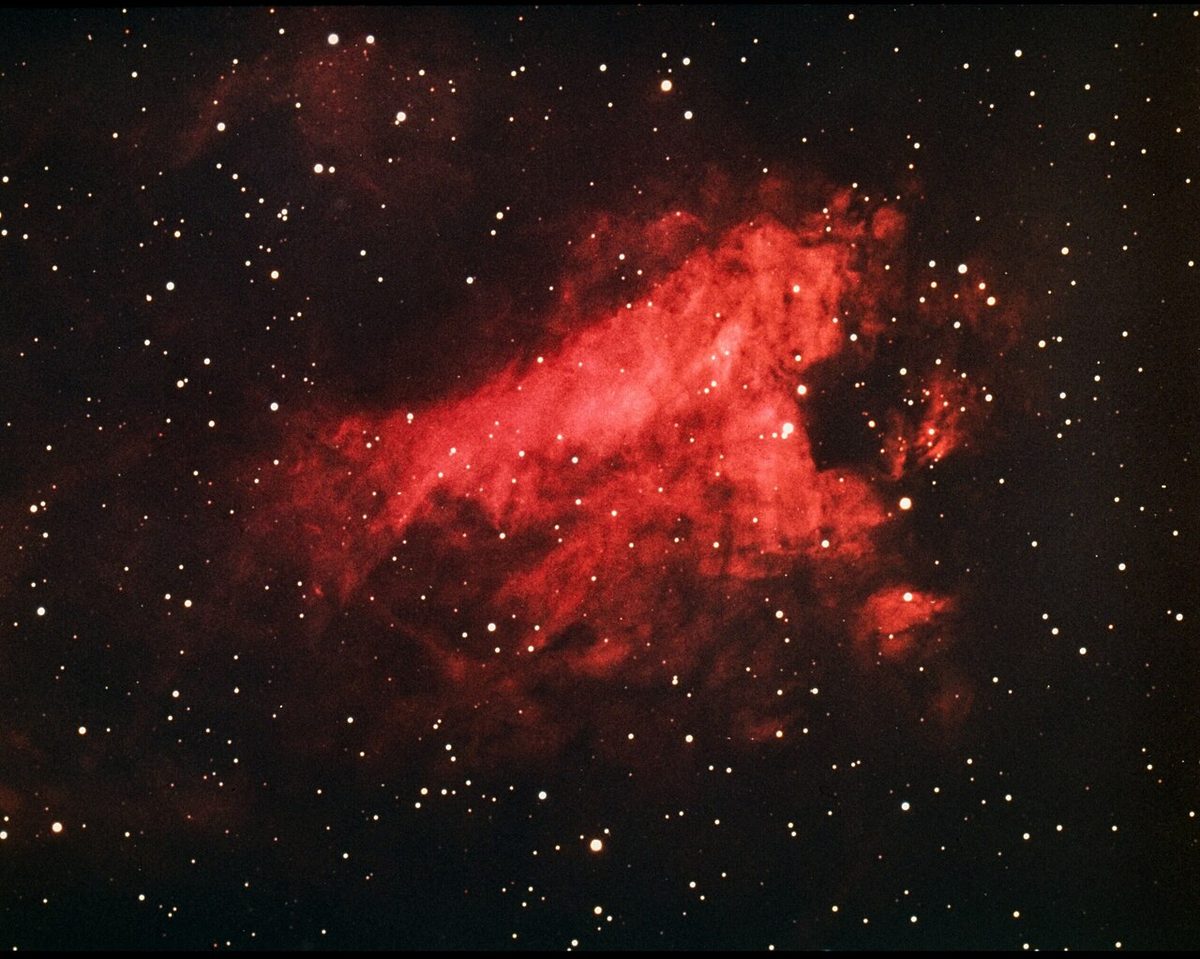 Photograph of Omega Nebula (M17), an emission nebula in Sagittarius