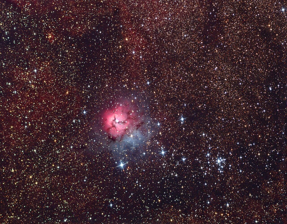 Photograph of Trifid Nebula (M20), an emission nebula in Sagittarius