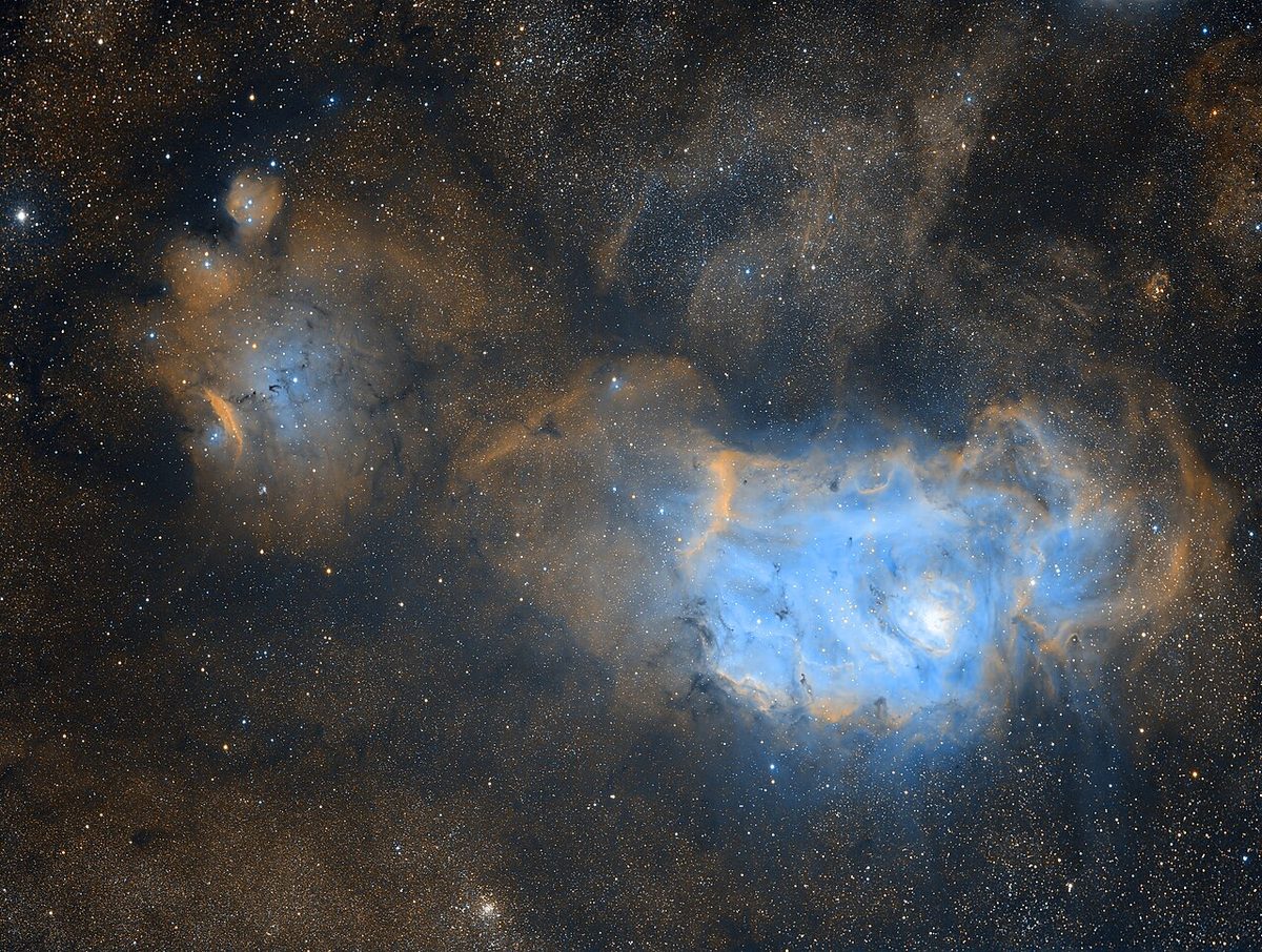 Photograph of Lagoon Nebula (M8), an emission nebula in Sagittarius